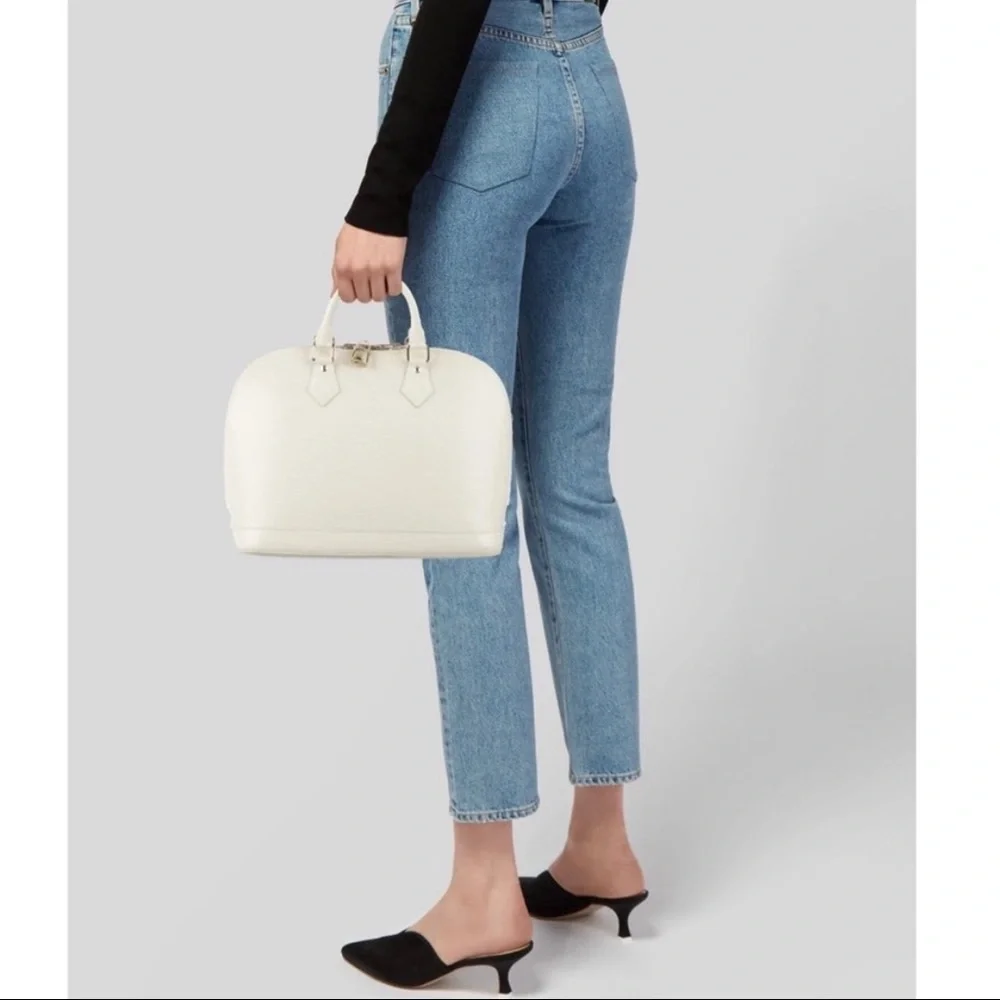 Authentic Louis Vuitton ivory EPI Alma PM bag